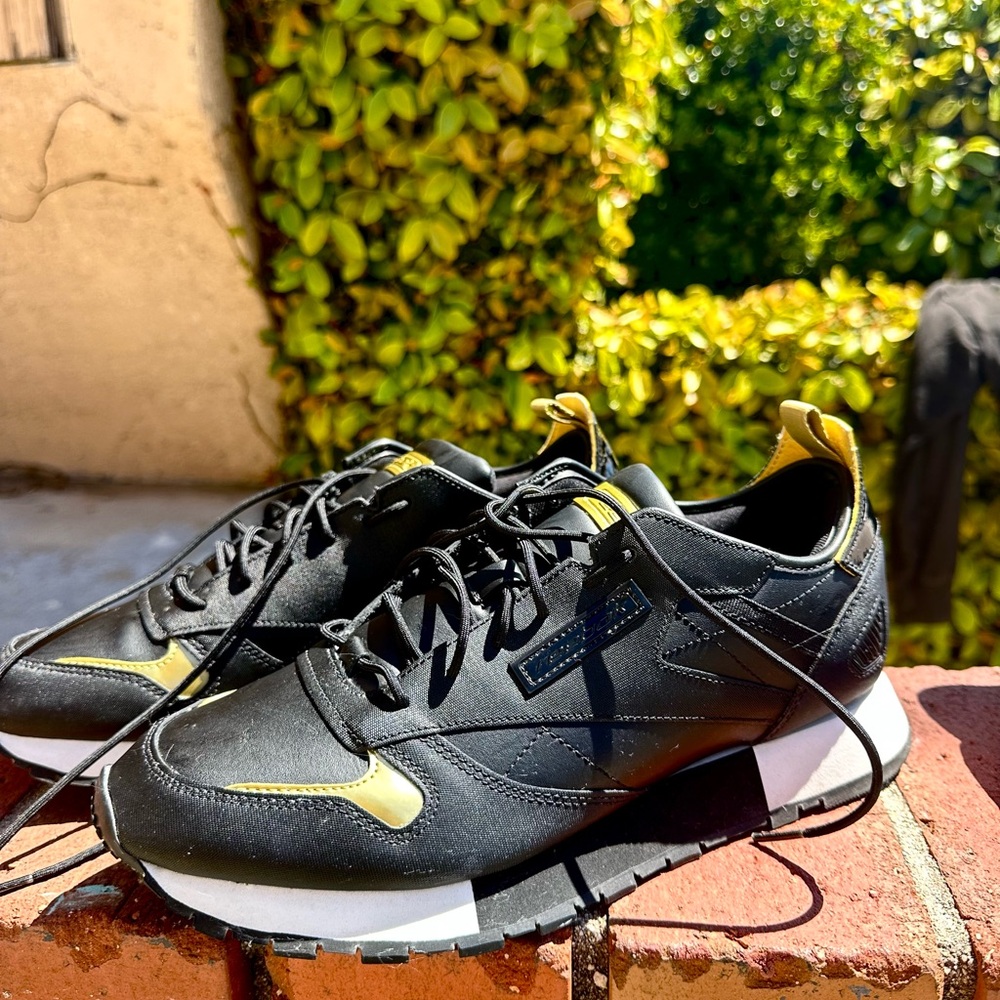 Reebok Black and Gold Sneakers